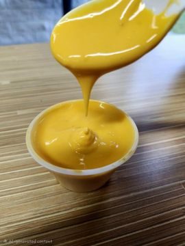 Cheese Sauce at Hot Dog Diner & Burger Company in Parma, Ohio